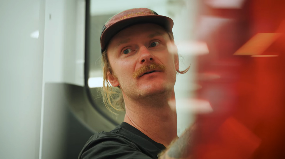 A man in a factory environement.